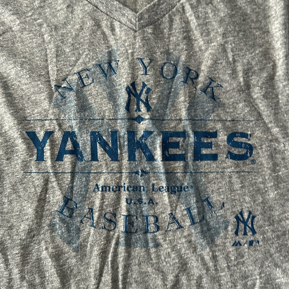 Yankees women’s v neck t-shirt grey. Never worn bought at yankee stadium NWT